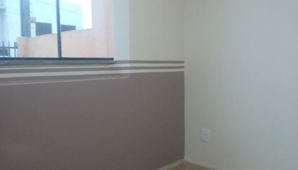 Pintura interna decorativa com frisos